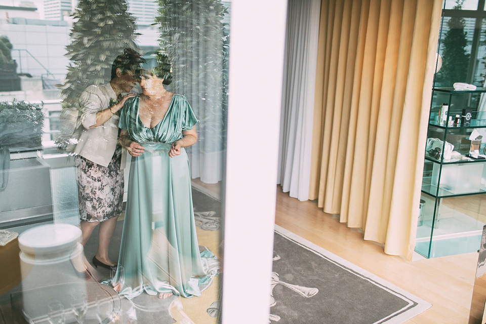 A pale green silk dress by The State of Grace, for an elegant London Wedding. Photography by Lee Garland.