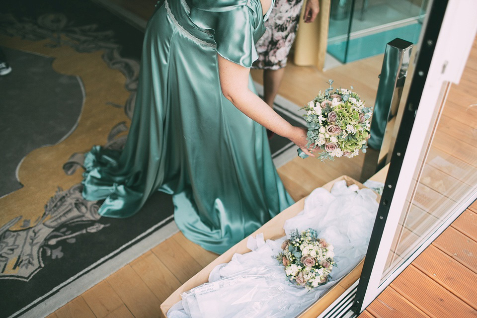 A pale green silk dress by The State of Grace, for an elegant London Wedding. Photography by Lee Garland.