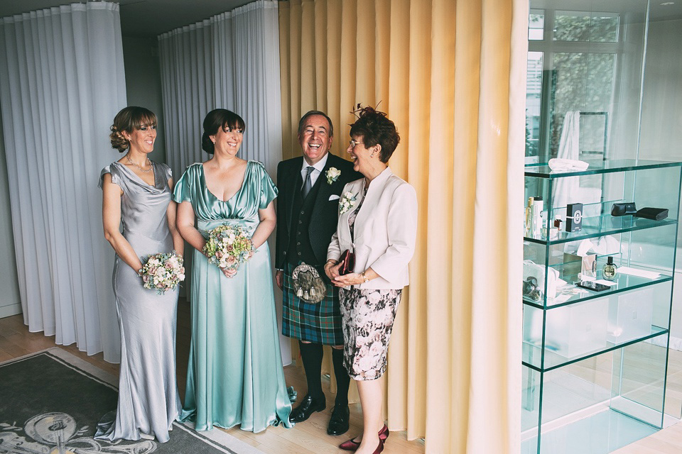 A pale green silk dress by The State of Grace, for an elegant London Wedding. Photography by Lee Garland.