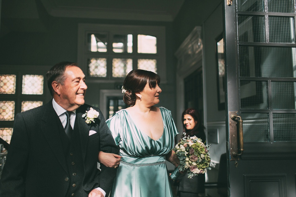 A pale green silk dress by The State of Grace, for an elegant London Wedding. Photography by Lee Garland.