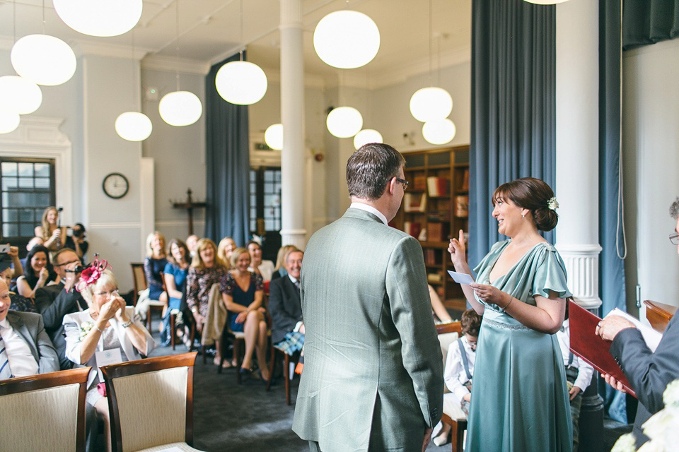 A pale green silk dress by The State of Grace, for an elegant London Wedding. Photography by Lee Garland.