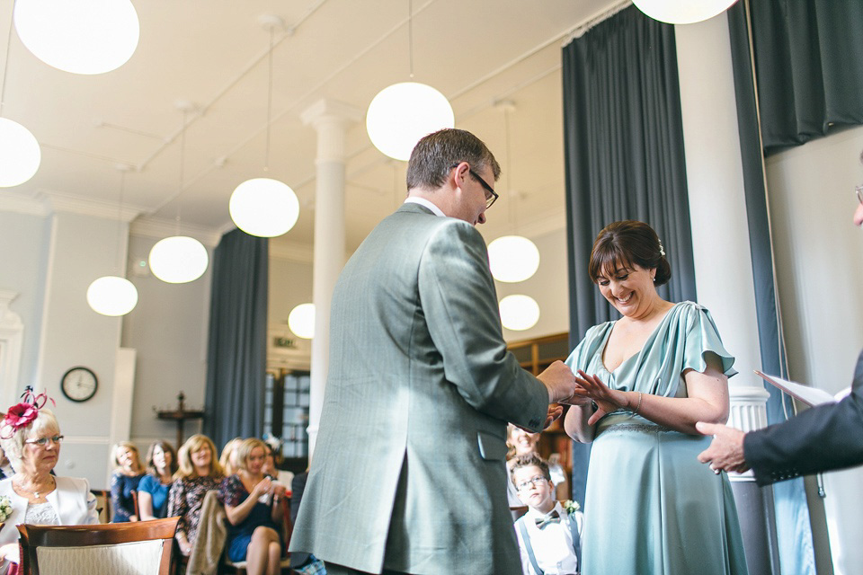 A pale green silk dress by The State of Grace, for an elegant London Wedding. Photography by Lee Garland.