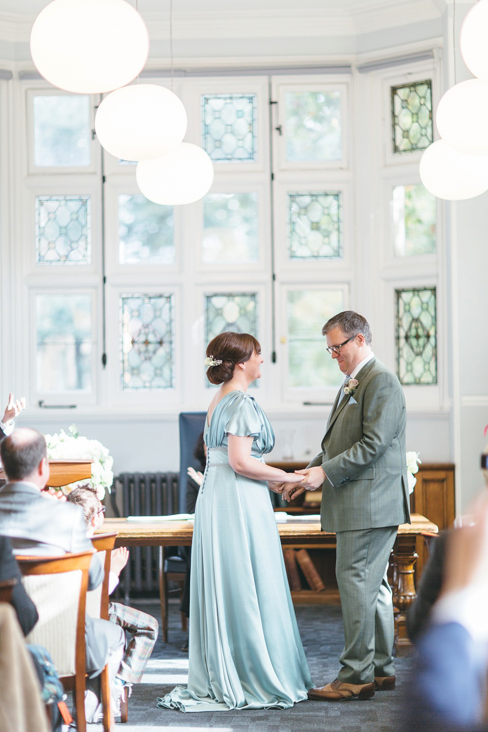 A pale green silk dress by The State of Grace, for an elegant London Wedding. Photography by Lee Garland.