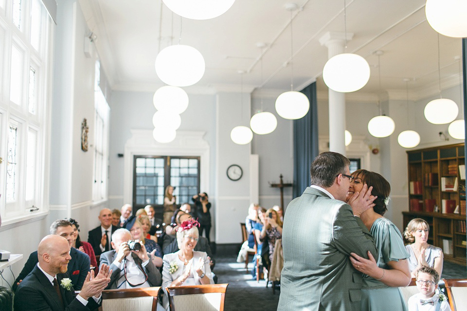 A pale green silk dress by The State of Grace, for an elegant London Wedding. Photography by Lee Garland.