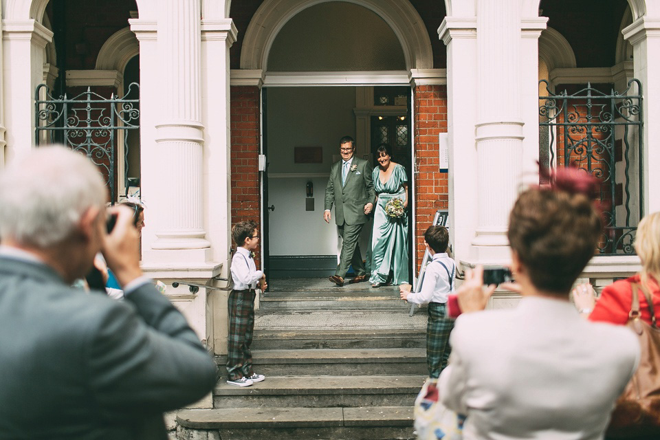 A pale green silk dress by The State of Grace, for an elegant London Wedding. Photography by Lee Garland.