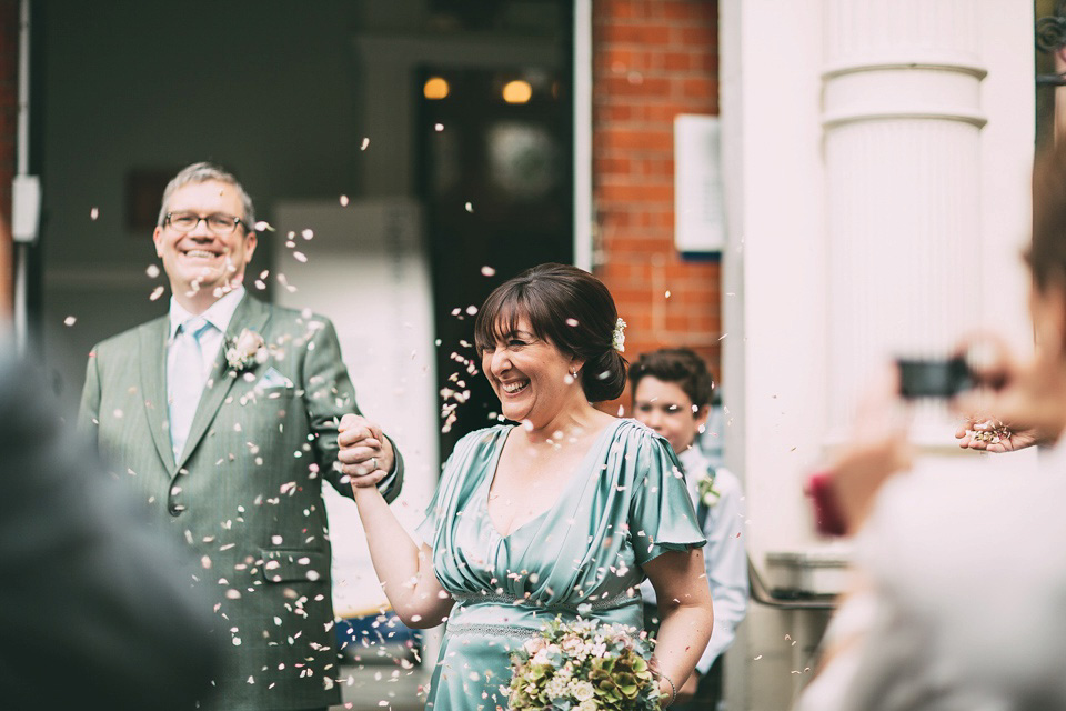 A pale green silk dress by The State of Grace, for an elegant London Wedding. Photography by Lee Garland.