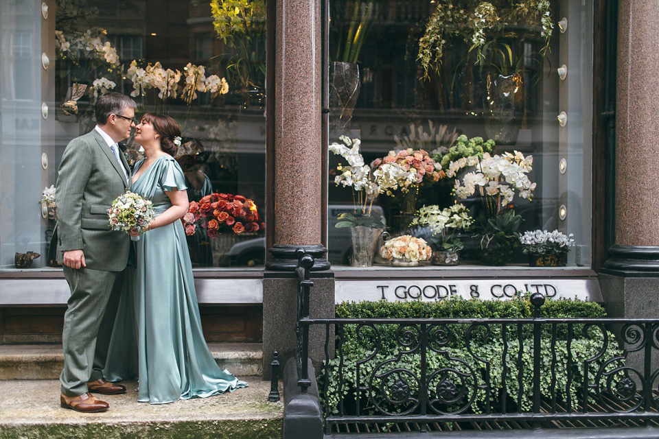 A pale green silk dress by The State of Grace, for an elegant London Wedding. Photography by Lee Garland.