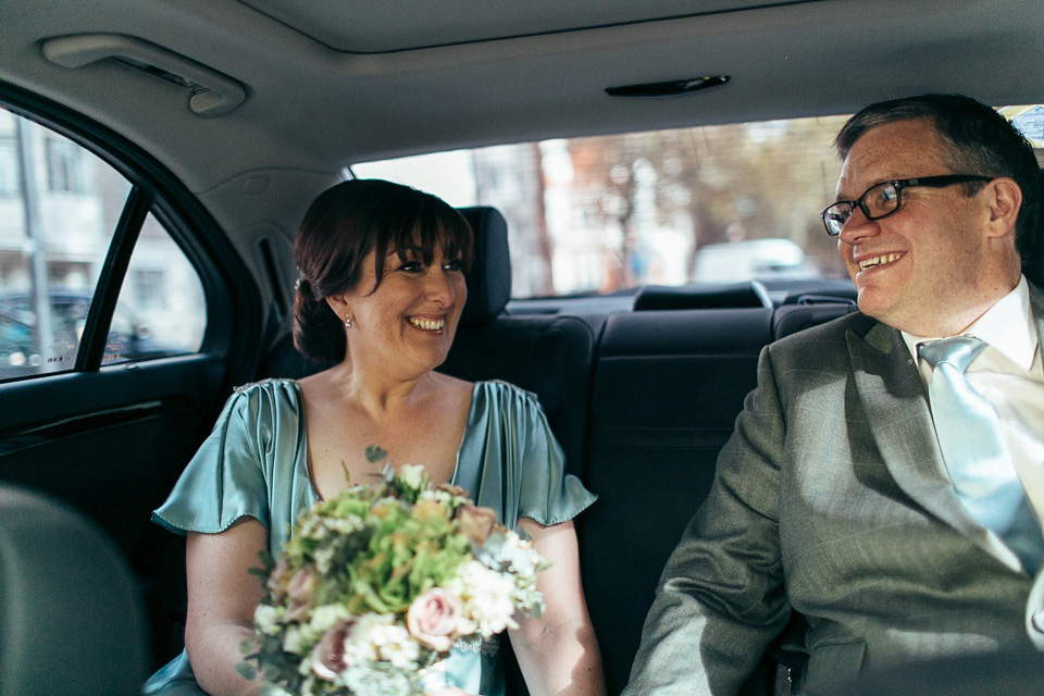 A pale green silk dress by The State of Grace, for an elegant London Wedding. Photography by Lee Garland.