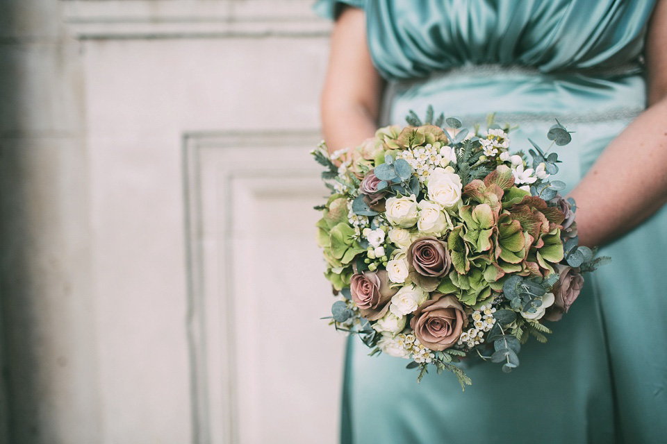 A pale green silk dress by The State of Grace, for an elegant London Wedding. Photography by Lee Garland.