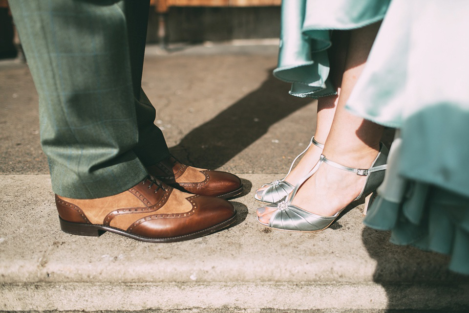 A pale green silk dress by The State of Grace, for an elegant London Wedding. Photography by Lee Garland.