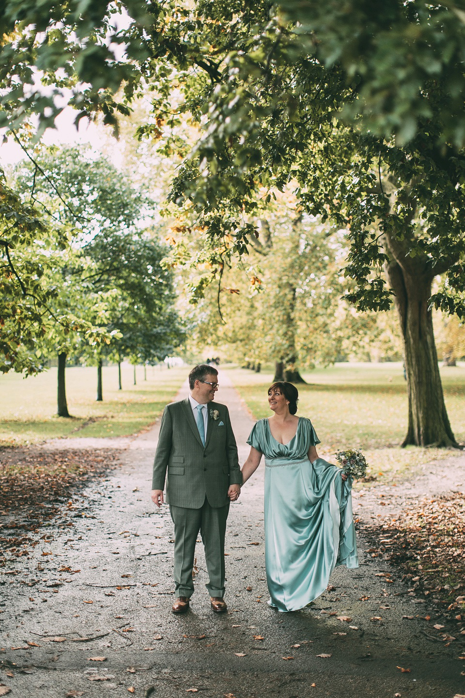 A pale green silk dress by The State of Grace, for an elegant London Wedding. Photography by Lee Garland.