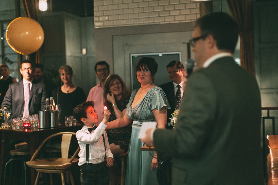 A pale green silk dress by The State of Grace, for an elegant London Wedding. Photography by Lee Garland.