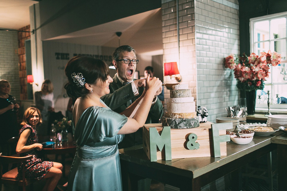 A pale green silk dress by The State of Grace, for an elegant London Wedding. Photography by Lee Garland.