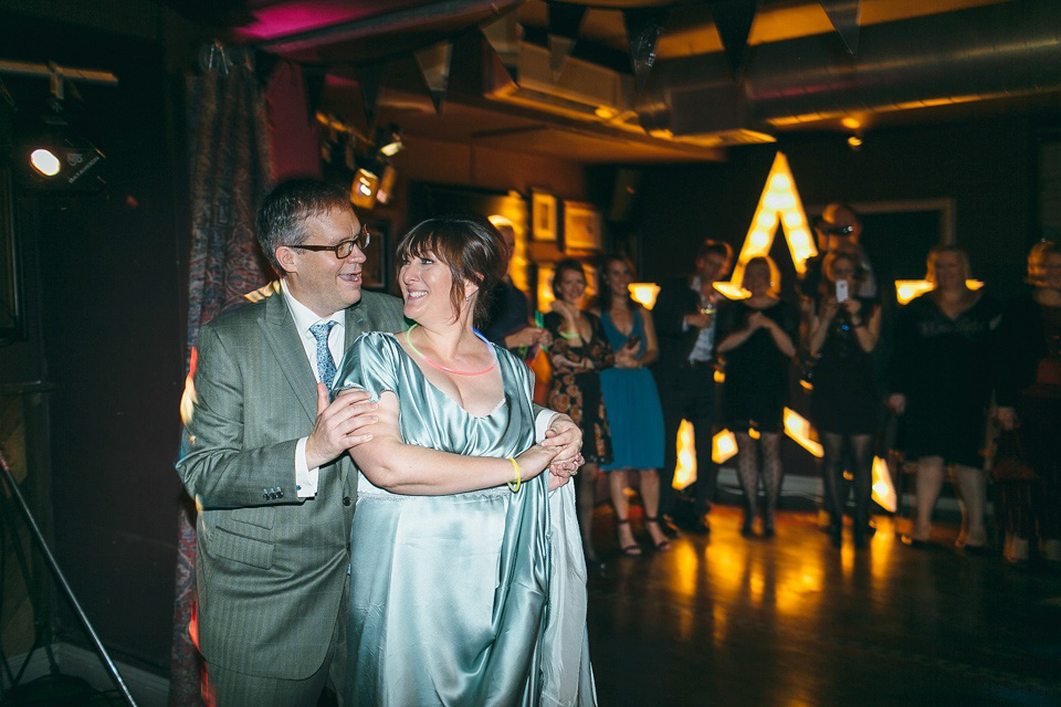 A pale green silk dress by The State of Grace, for an elegant London Wedding. Photography by Lee Garland.