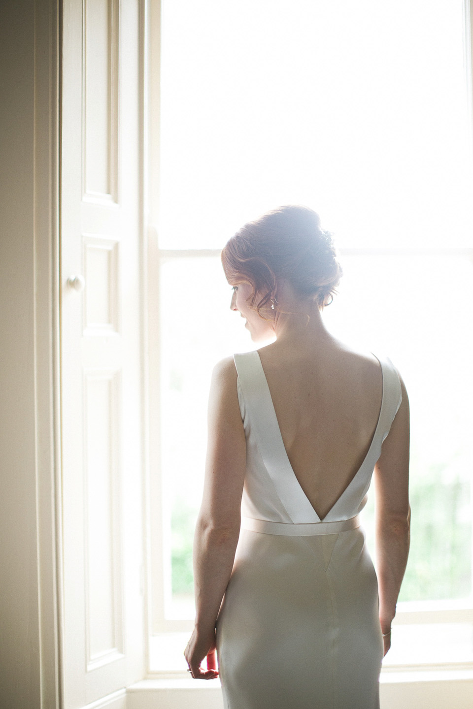 A bride wearing Cassandra by Sarah Janks for her castle wedding in Northern Ireland. Photography by Paula McManus.