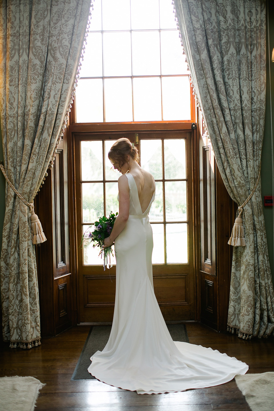 A bride wearing Cassandra by Sarah Janks for her castle wedding in Northern Ireland. Photography by Paula McManus.