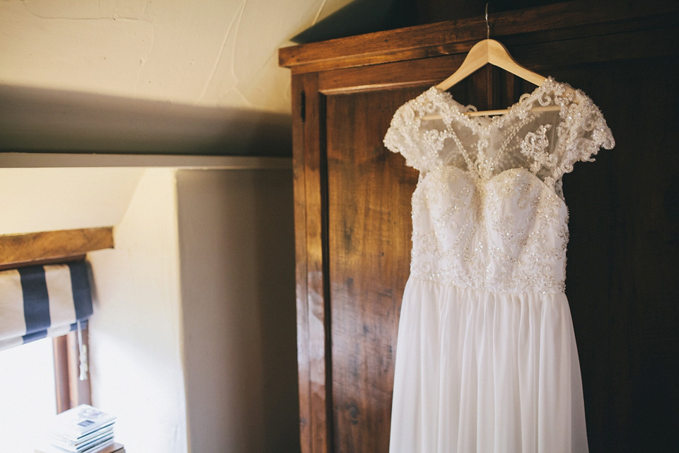 An elegant rustic Autumn wedding with a bride wearing flowers in her hair. Photography by Sally T.