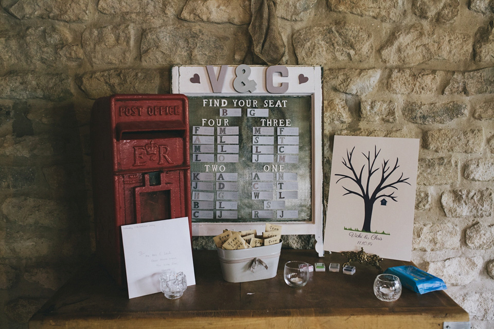 An elegant rustic Autumn wedding with a bride wearing flowers in her hair. Photography by Sally T.