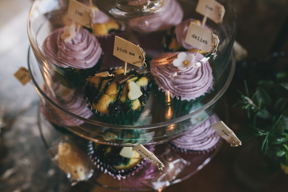 An elegant rustic Autumn wedding with a bride wearing flowers in her hair. Photography by Sally T.