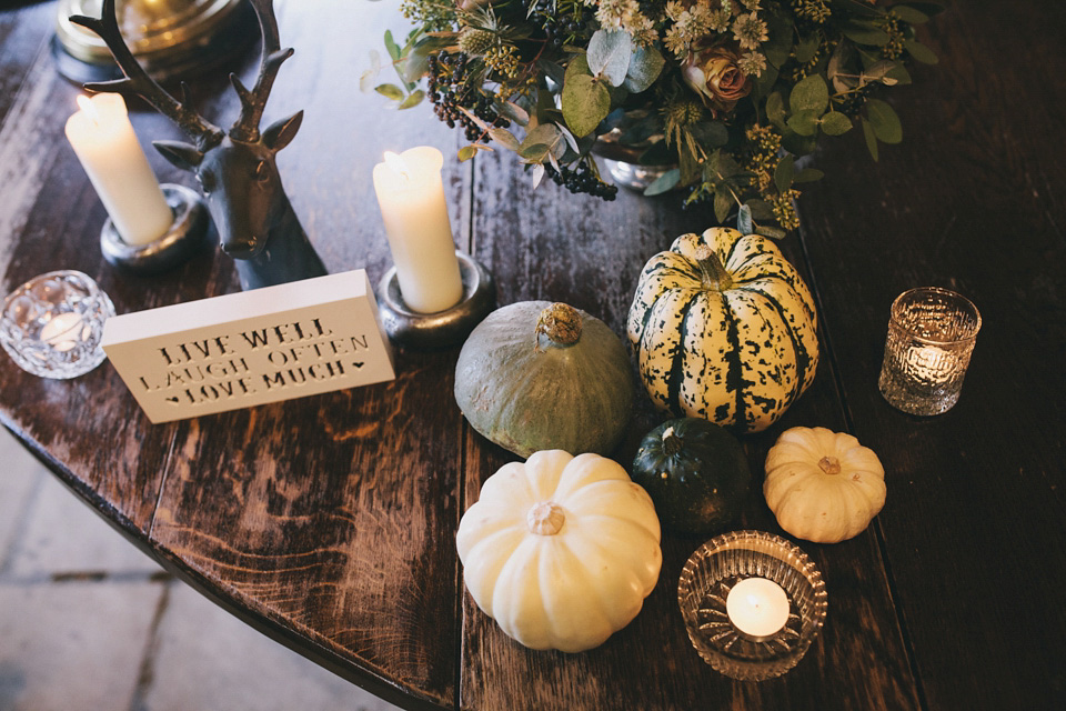 An elegant rustic Autumn wedding with a bride wearing flowers in her hair. Photography by Sally T.