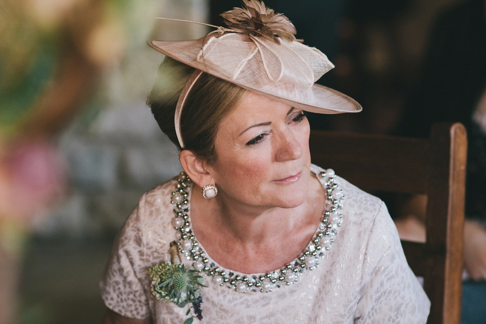 An elegant rustic Autumn wedding with a bride wearing flowers in her hair. Photography by Sally T.