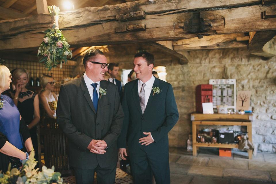 An elegant rustic Autumn wedding with a bride wearing flowers in her hair. Photography by Sally T.