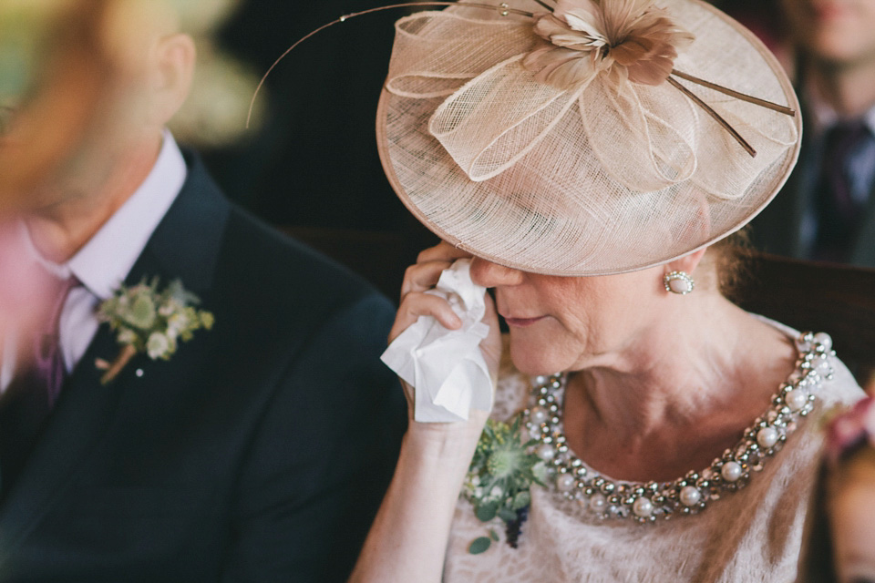 An elegant rustic Autumn wedding with a bride wearing flowers in her hair. Photography by Sally T.