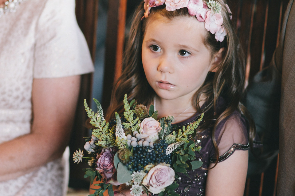 An elegant rustic Autumn wedding with a bride wearing flowers in her hair. Photography by Sally T.