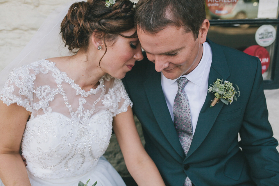 An elegant rustic Autumn wedding with a bride wearing flowers in her hair. Photography by Sally T.