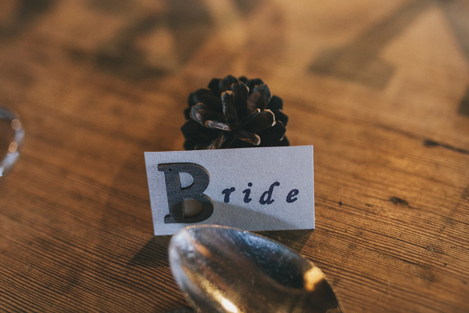 An elegant rustic Autumn wedding with a bride wearing flowers in her hair. Photography by Sally T.