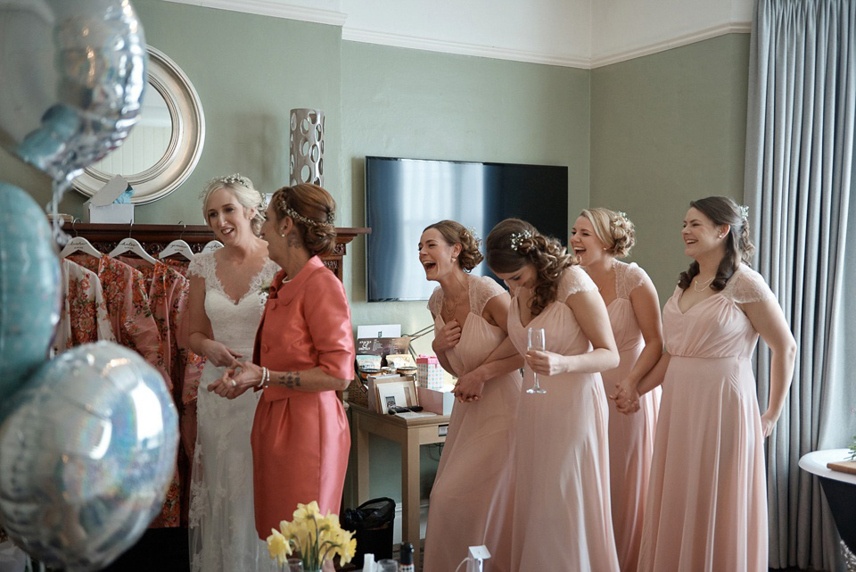 A First Look and maids in pretty pink for a Springtime in the Woods inspired wedding. Photography by Tino & Pip.  Love My Dress UK Wedding Blog.