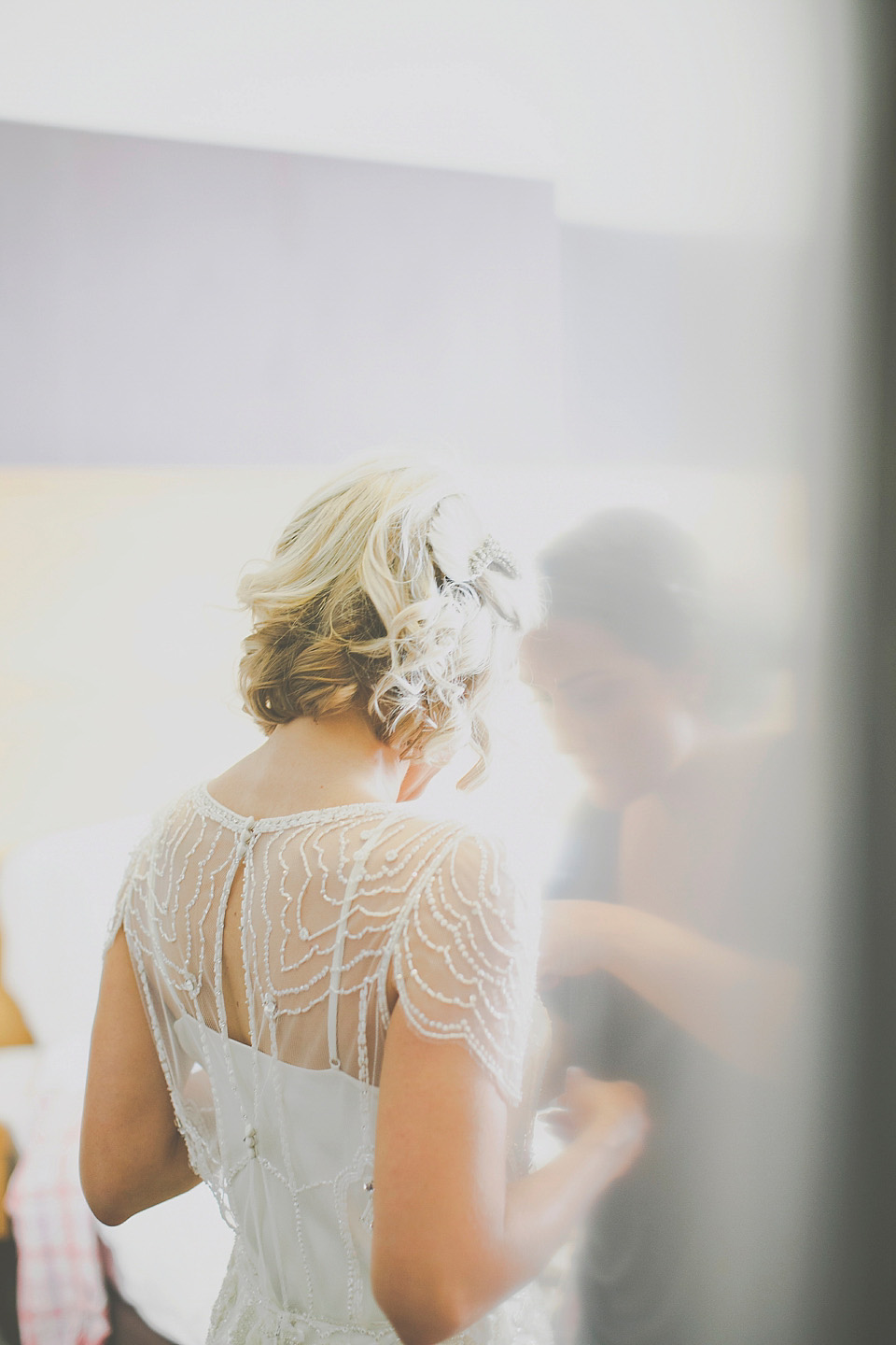 A bride wearing Eden by Jenny Packham for her coastal and rustic inspired wedding at Danby Castle in the North Yorkshire Moors. Photography by James Melia.