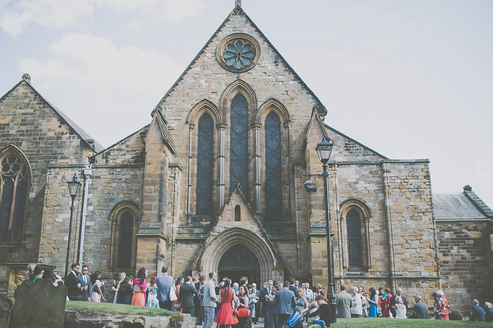 A bride wearing Eden by Jenny Packham for her coastal and rustic inspired wedding at Danby Castle in the North Yorkshire Moors. Photography by James Melia.