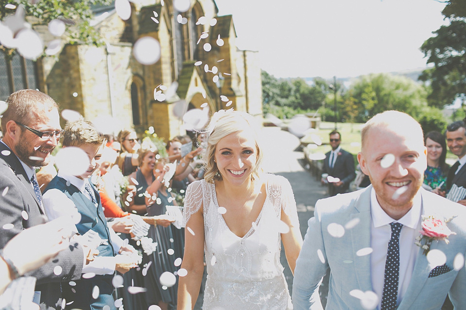 A bride wearing Eden by Jenny Packham for her coastal and rustic inspired wedding at Danby Castle in the North Yorkshire Moors. Photography by James Melia.