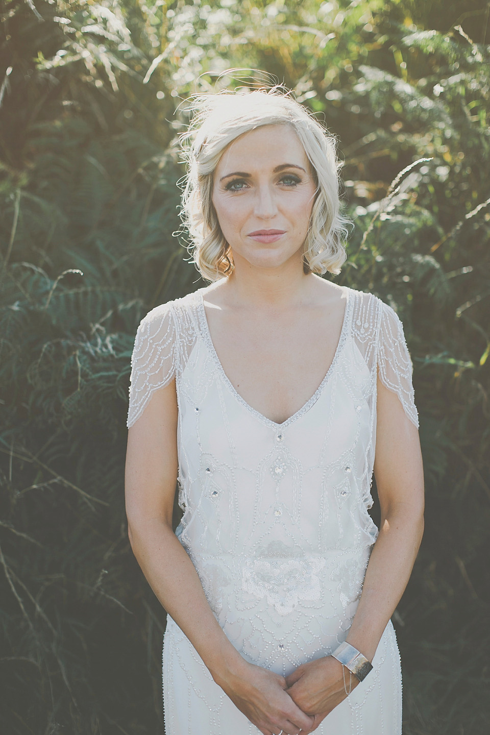 A bride wearing Eden by Jenny Packham for her coastal and rustic inspired wedding at Danby Castle in the North Yorkshire Moors. Photography by James Melia.