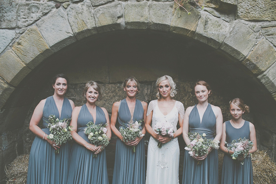 A bride wearing Eden by Jenny Packham for her coastal and rustic inspired wedding at Danby Castle in the North Yorkshire Moors. Photography by James Melia.