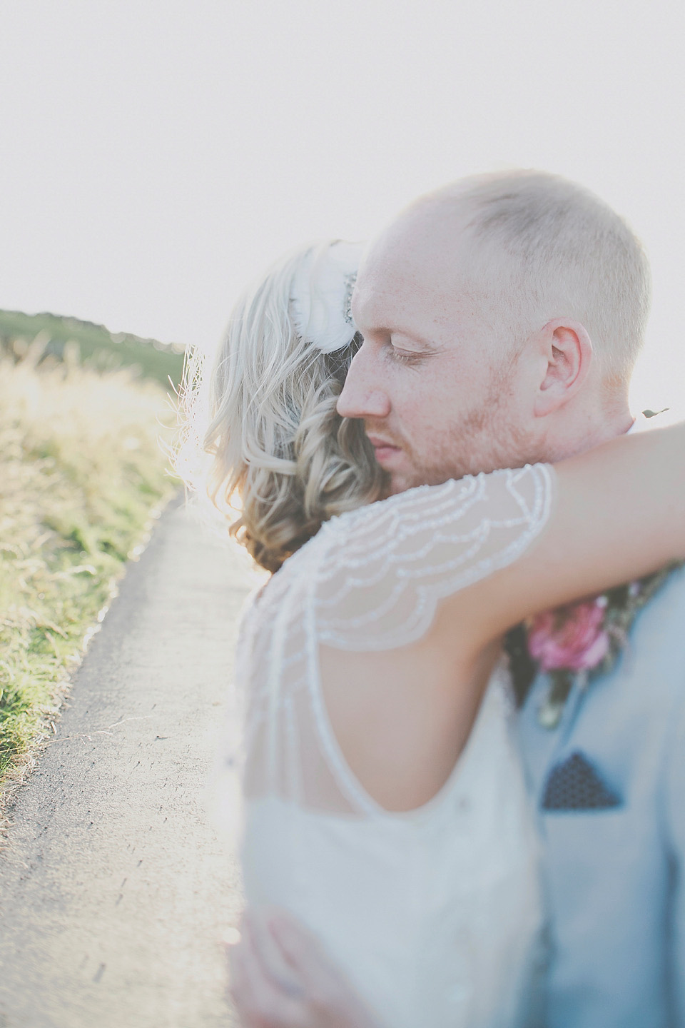 A bride wearing Eden by Jenny Packham for her coastal and rustic inspired wedding at Danby Castle in the North Yorkshire Moors. Photography by James Melia.