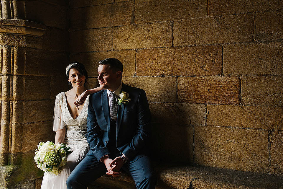 The bride wears Anoushka G for her relaxed, family focussed Spring wedding at Riddlesden Hall in West Yorkshire. Photography by Paul Joseph.