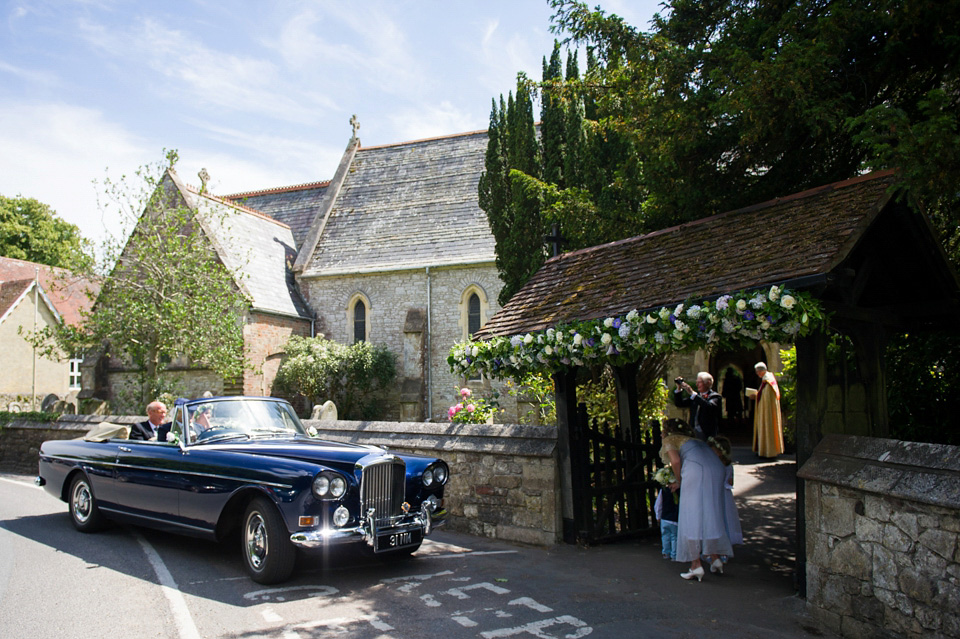 A Sally Lacock wedding dress made from romantic lace, for a pretty Summer garden wedding on the Isle of Wight. Photography by Especially Amy.