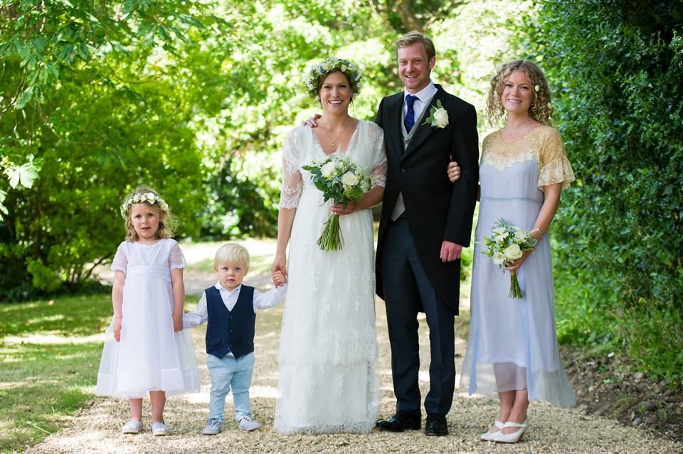 A Sally Lacock wedding dress made from romantic lace, for a pretty Summer garden wedding on the Isle of Wight. Photography by Especially Amy.