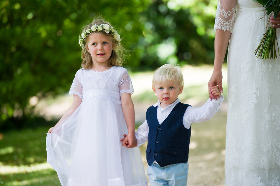 A Sally Lacock wedding dress made from romantic lace, for a pretty Summer garden wedding on the Isle of Wight. Photography by Especially Amy.