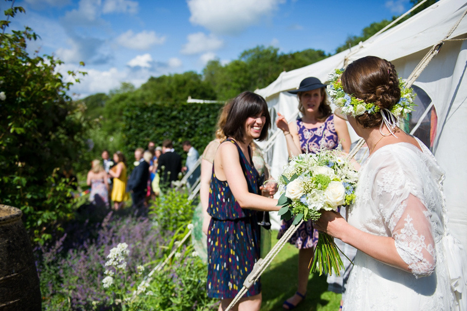 A Sally Lacock wedding dress made from romantic lace, for a pretty Summer garden wedding on the Isle of Wight. Photography by Especially Amy.