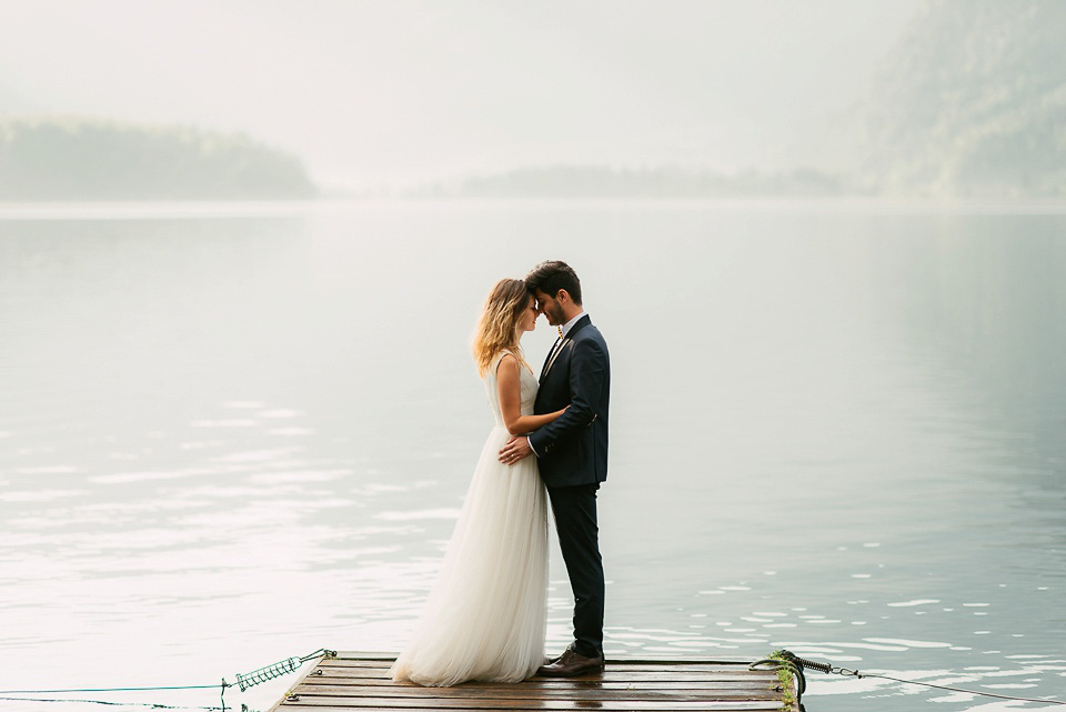 An after the wedding portrait shoot in the beautiful Austrian village of Hallstatt. Images by Land of White Deer Photography.