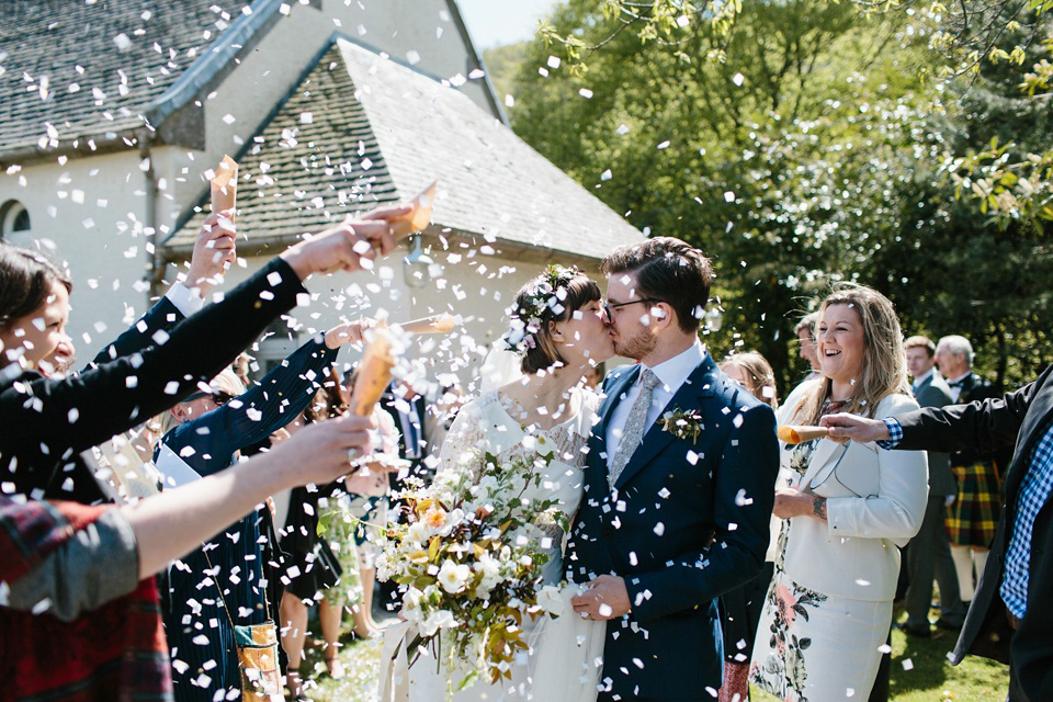 The bride wears 'Olsen' by Rime Arodaky, a purchase from The Mews Notting Hill, for her Scottish country house wedding at Eastwood House. Photography by Caro Weiss.