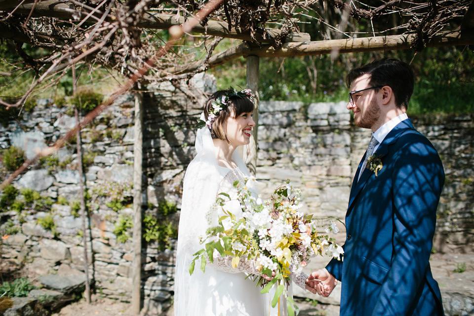 The bride wears 'Olsen' by Rime Arodaky, a purchase from The Mews Notting Hill, for her Scottish country house wedding at Eastwood House. Photography by Caro Weiss.