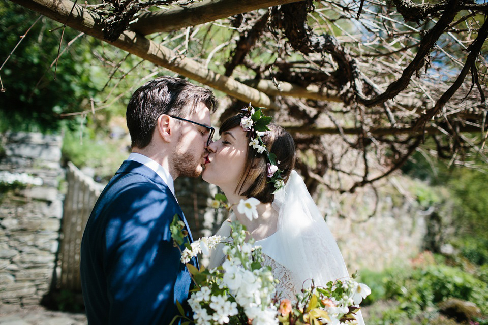 The bride wears 'Olsen' by Rime Arodaky, a purchase from The Mews Notting Hill, for her Scottish country house wedding at Eastwood House. Photography by Caro Weiss.