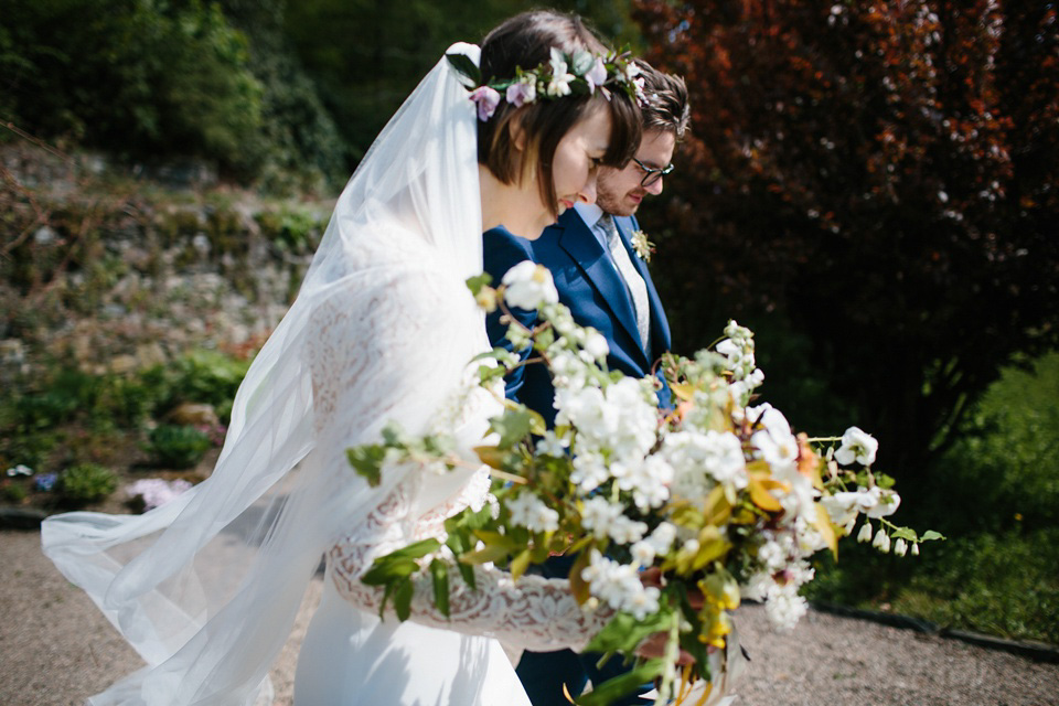 The bride wears 'Olsen' by Rime Arodaky, a purchase from The Mews Notting Hill, for her Scottish country house wedding at Eastwood House. Photography by Caro Weiss.