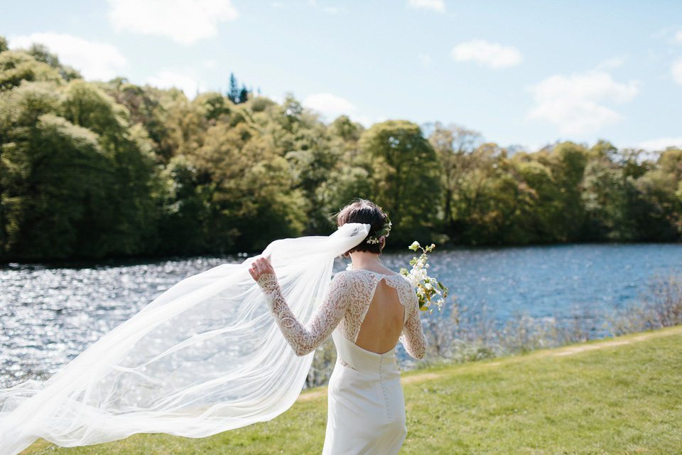 The bride wears 'Olsen' by Rime Arodaky, a purchase from The Mews Notting Hill, for her Scottish country house wedding at Eastwood House. Photography by Caro Weiss.