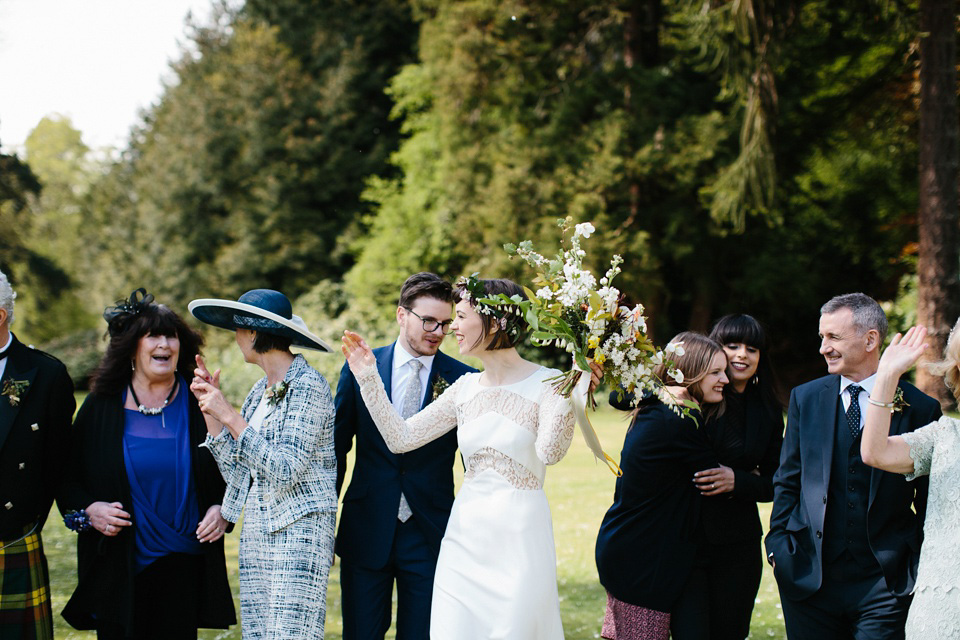 The bride wears 'Olsen' by Rime Arodaky, a purchase from The Mews Notting Hill, for her Scottish country house wedding at Eastwood House. Photography by Caro Weiss.