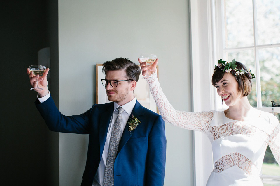 The bride wears 'Olsen' by Rime Arodaky, a purchase from The Mews Notting Hill, for her Scottish country house wedding at Eastwood House. Photography by Caro Weiss.